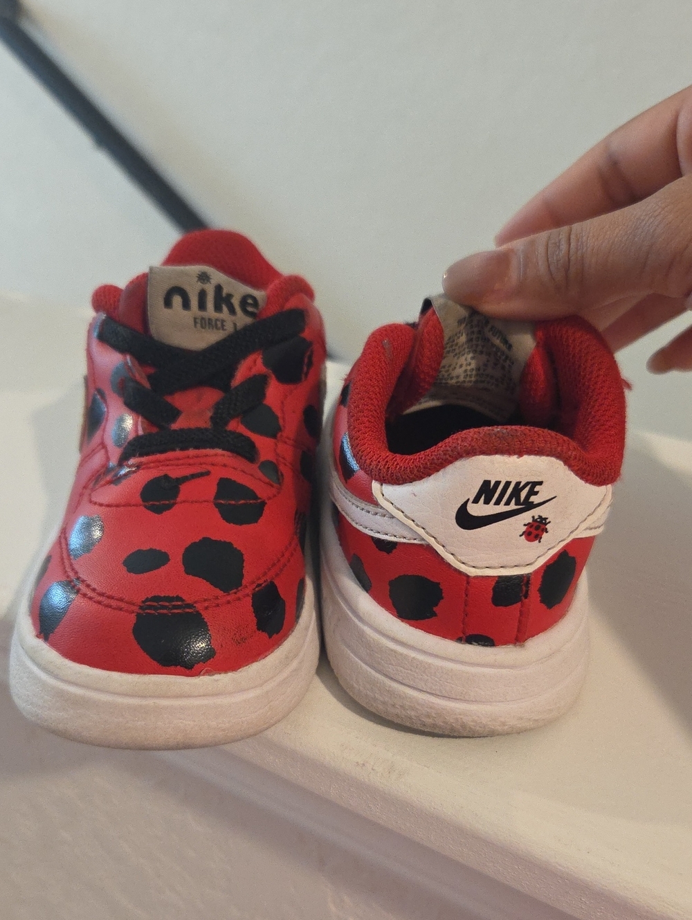 Nike Kids Red and Black Ladybug Accent Sneakers